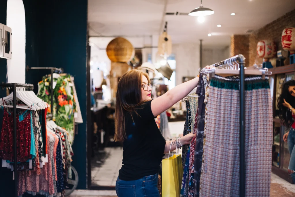 Attractive woman choosing clothes